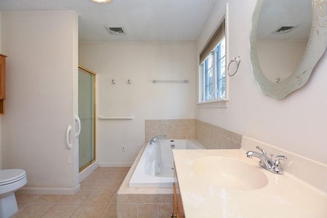 full bathroom with visible vents, a shower stall, vanity, tile patterned floors, and toilet