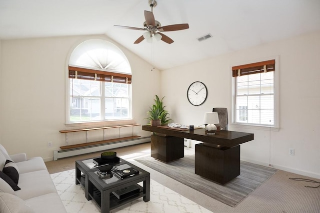 office area with visible vents, light carpet, a baseboard heating unit, a ceiling fan, and vaulted ceiling