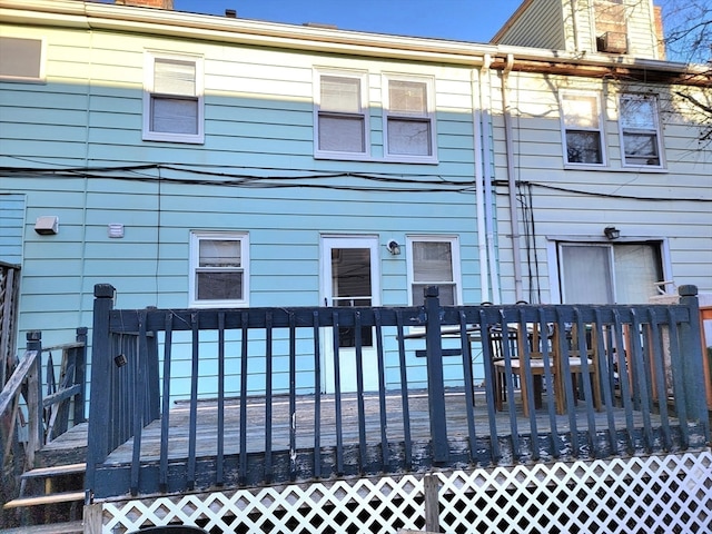 rear view of property with a deck