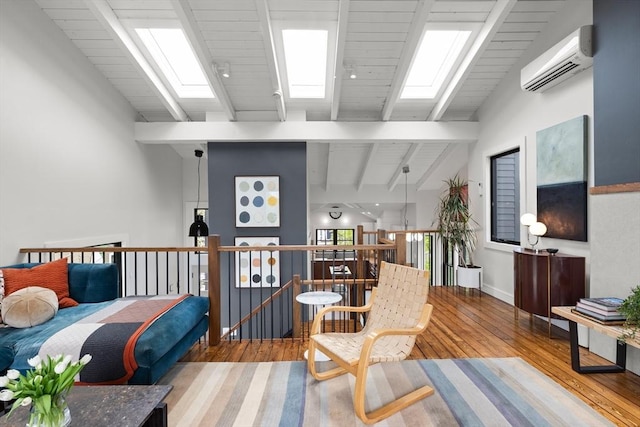 9 Upland Rd, Marblehead, MA 01945 - bedroom with a wall mounted air conditioner, beam ceiling, hardwood / wood-style flooring, wooden ceiling, and a skylight