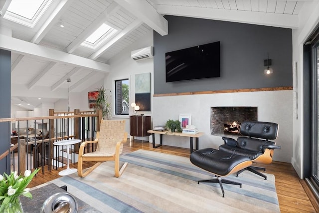 9 Upland Rd, Marblehead, MA 01945 - living room featuring a wall mounted AC, hardwood / wood-style floors, a lit fireplace, a skylight, and wooden ceiling