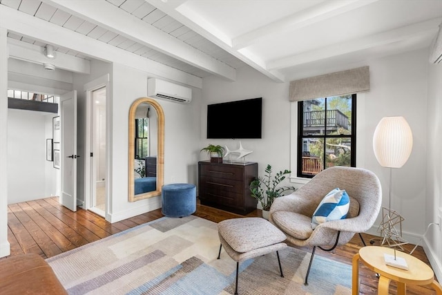 9 Upland Rd, Marblehead, MA 01945 - living area with a wall mounted AC, hardwood / wood-style flooring, baseboards, and beamed ceiling