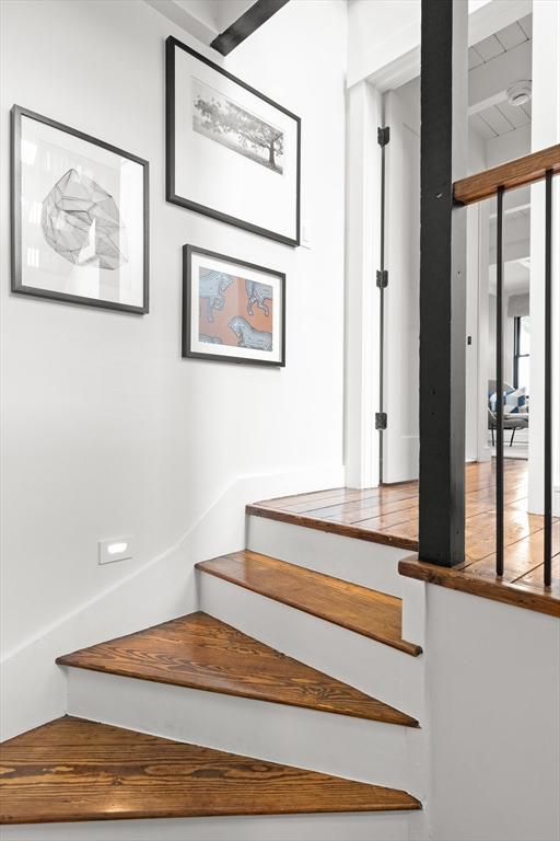 9 Upland Rd, Marblehead, MA 01945 - stairs with wood finished floors and beam ceiling