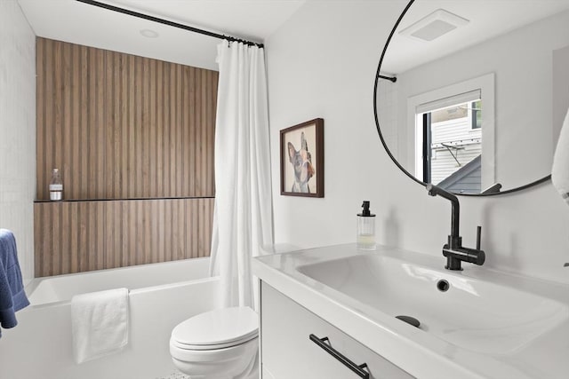 9 Upland Rd, Marblehead, MA 01945 - bathroom with toilet, vanity, and shower / bath combo