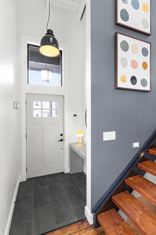 9 Upland Rd, Marblehead, MA 01945 - entrance foyer with stairway and baseboards