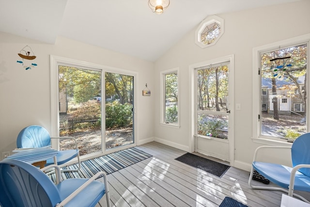 sunroom / solarium with lofted ceiling