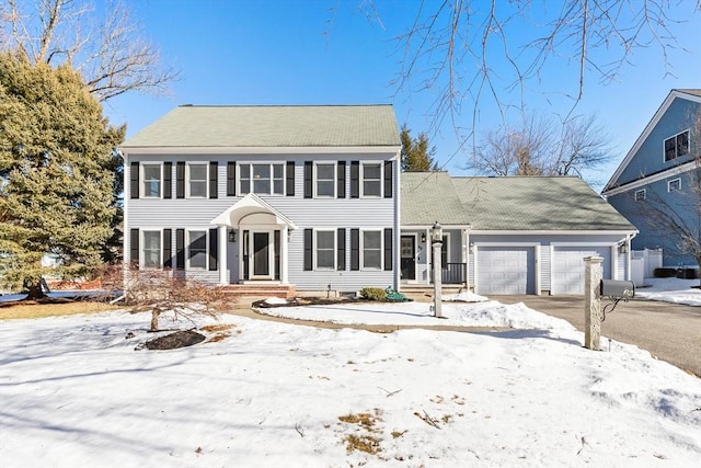 colonial-style house with a garage