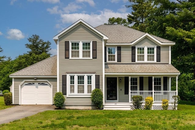 20 Starling Way, Leominster, MA 01453 - traditional-style house with a shingled roof, a porch, an attached garage, asphalt driveway, and a front yard