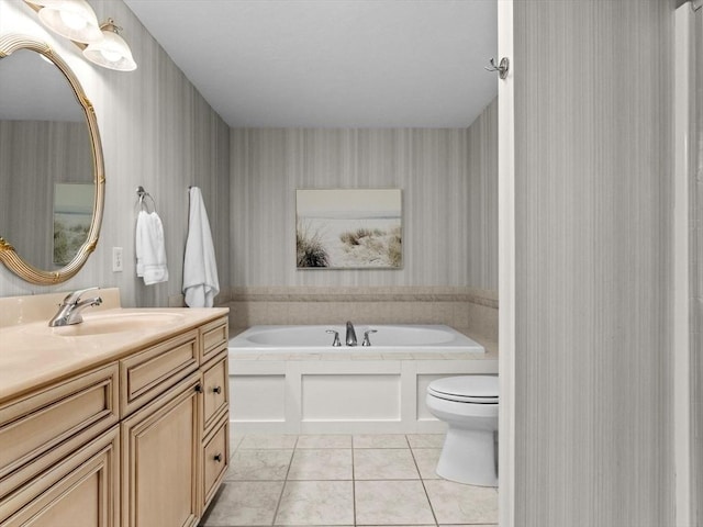 full bathroom with wallpapered walls, a garden tub, tile patterned floors, vanity, and toilet