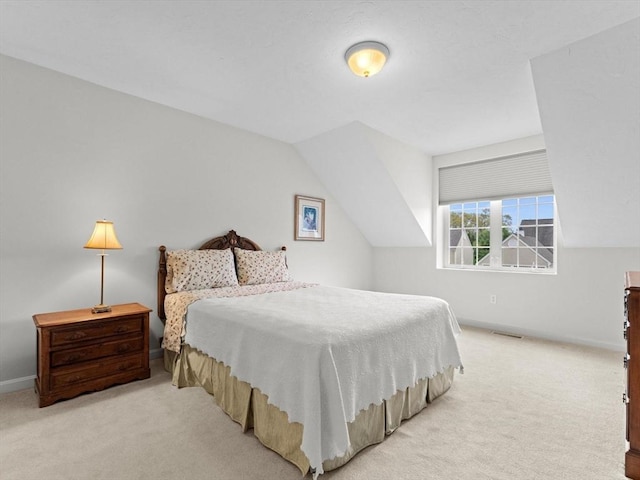 carpeted bedroom with baseboards