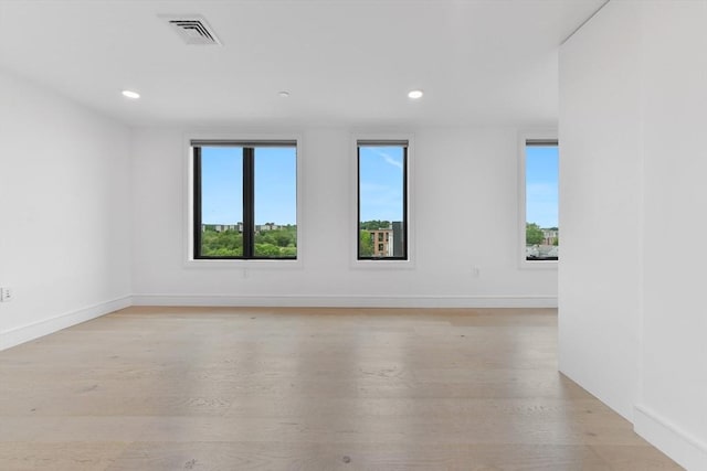 50 Leo M Birmingham Pkwy Unit 509, Boston, MA 02135 - spare room with light wood-style flooring, recessed lighting, and baseboards