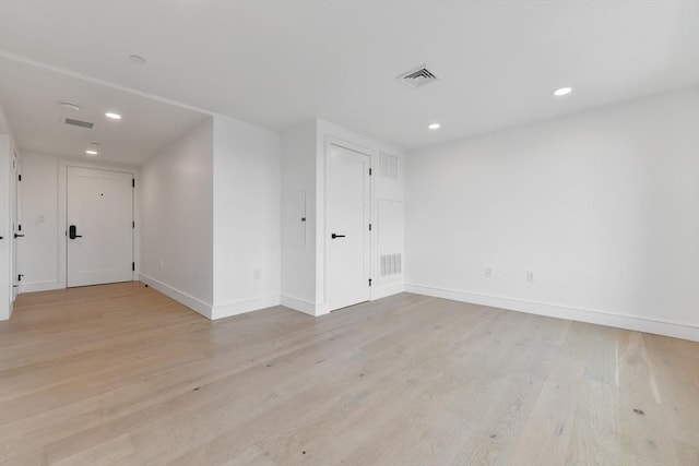 50 Leo M Birmingham Pkwy Unit 509, Boston, MA 02135 - spare room with baseboards, light wood-style flooring, and recessed lighting