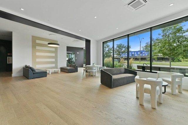 50 Leo M Birmingham Pkwy Unit 509, Boston, MA 02135 - common area with a wall of windows and recessed lighting