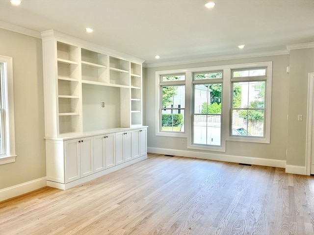 50 York Ave Unit 50, Watertown, MA 02472 - empty room with crown molding, healthy amount of natural light, light wood-style floors, and recessed lighting