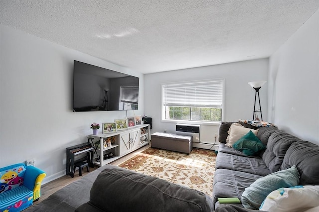 135 Grove St Unit 145, Rockland, MA 02370 - living room with a textured ceiling and wood finished floors