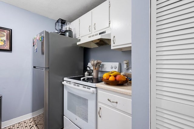 135 Grove St Unit 145, Rockland, MA 02370 - kitchen featuring under cabinet range hood, white electric stove, freestanding refrigerator, white cabinetry, and light countertops