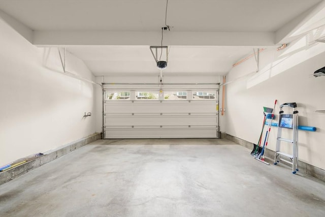 12 Bowood Ln Unit 36, Marlborough, MA 01752 - garage featuring a garage door opener