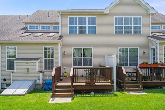 12 Bowood Ln Unit 36, Marlborough, MA 01752 - back of house with a deck, a yard, and roof with shingles