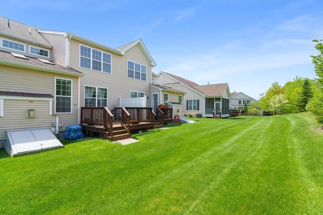 12 Bowood Ln Unit 36, Marlborough, MA 01752 - back of house with a deck and a yard