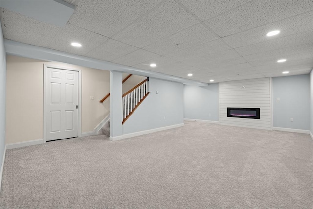 12 Bowood Ln Unit 36, Marlborough, MA 01752 - finished below grade area featuring carpet floors, recessed lighting, stairs, a large fireplace, and baseboards