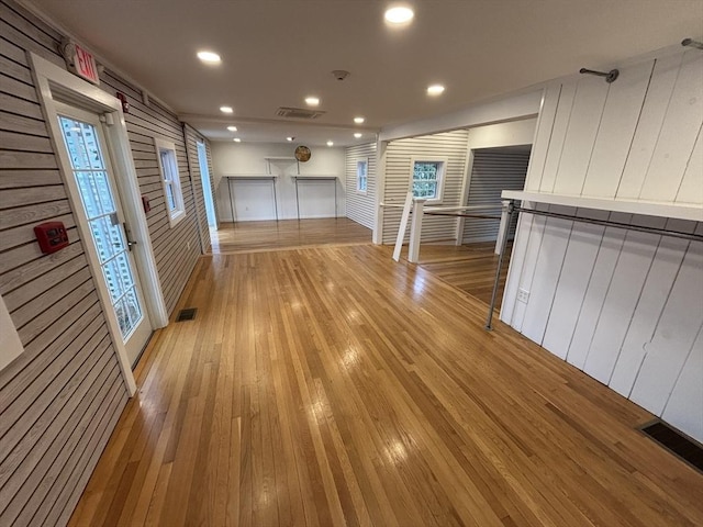 interior space featuring light wood finished floors, visible vents, and recessed lighting