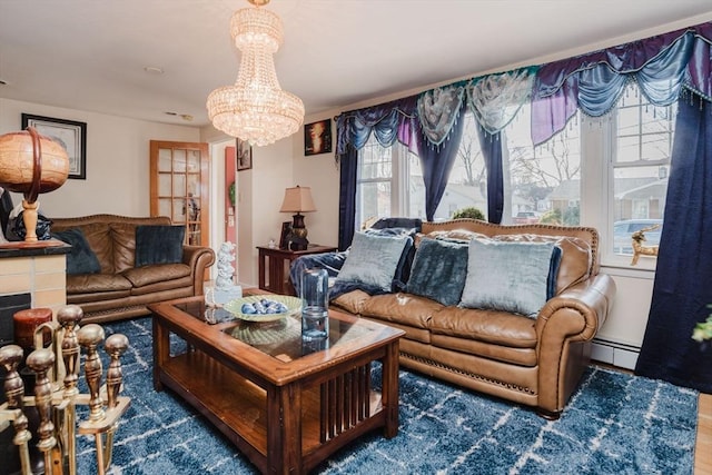 living room featuring a baseboard radiator, dark hardwood / wood-style flooring, and a chandelier