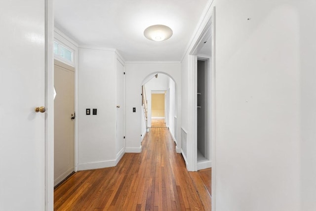 220 Prospect St, Seekonk, MA 02771 - corridor featuring arched walkways, light wood-style flooring, baseboards, and crown molding