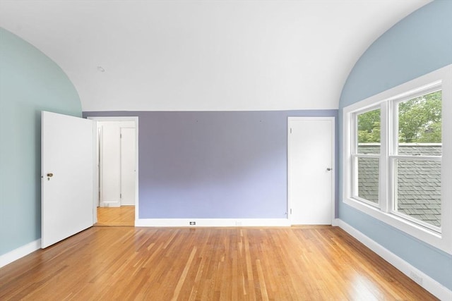 220 Prospect St, Seekonk, MA 02771 - unfurnished room with vaulted ceiling, light wood-style floors, and baseboards