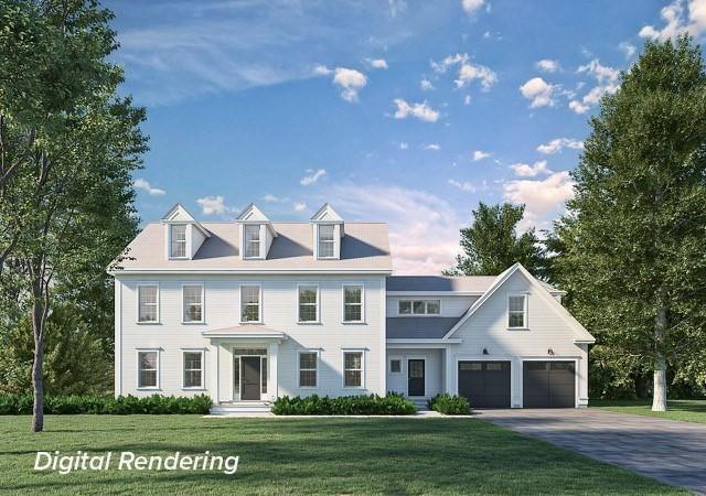 view of front of property with a front lawn and a garage