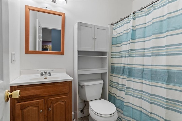 bathroom with a shower with curtain, toilet, and vanity