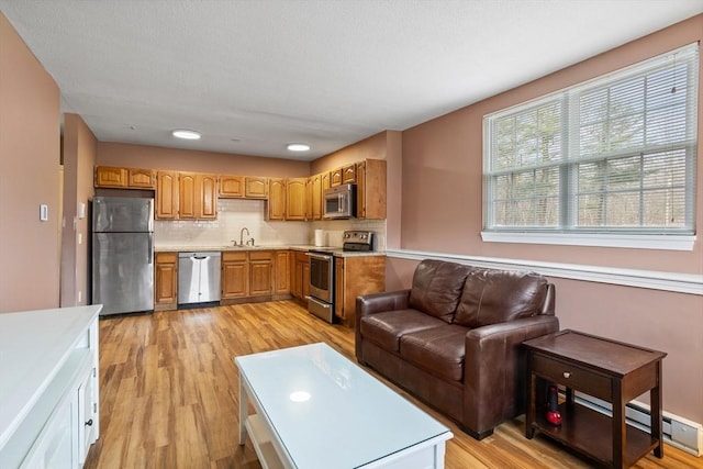 living area featuring light wood-style flooring