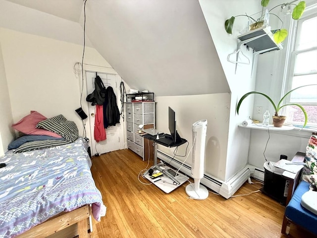 262 Adams St, Newton, MA 02458 - bedroom featuring wood finished floors and lofted ceiling