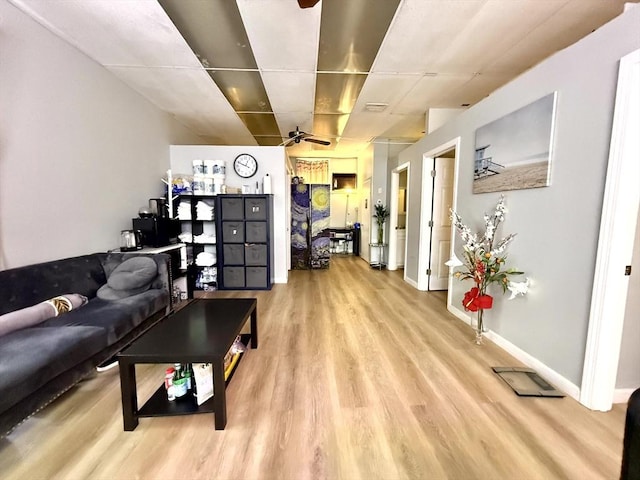 262 Adams St, Newton, MA 02458 - living area featuring light wood-type flooring, ceiling fan, and baseboards