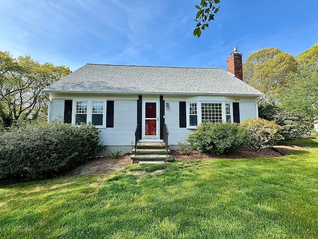 view of front of home with a front yard