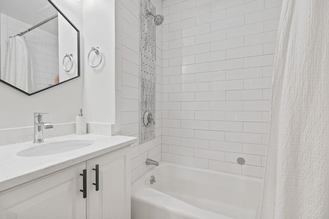 full bath featuring vanity and shower / tub combo
