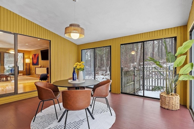 dining area with dark wood-type flooring