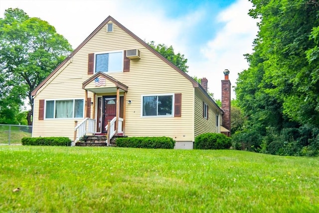 95 N Lowell St, Methuen, MA 01844 - bungalow featuring an AC wall unit and a chimney