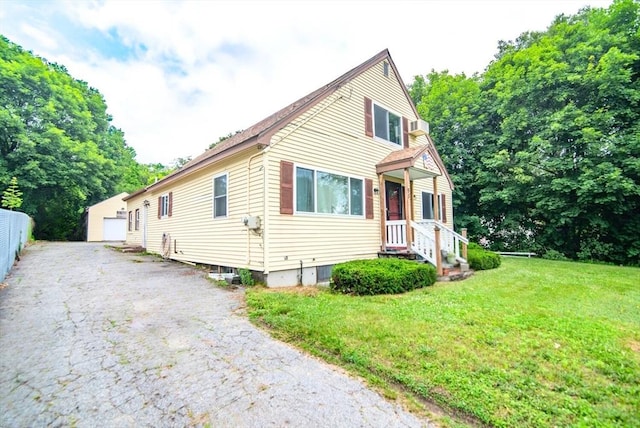 95 N Lowell St, Methuen, MA 01844 - bungalow with a front lawn and a detached garage