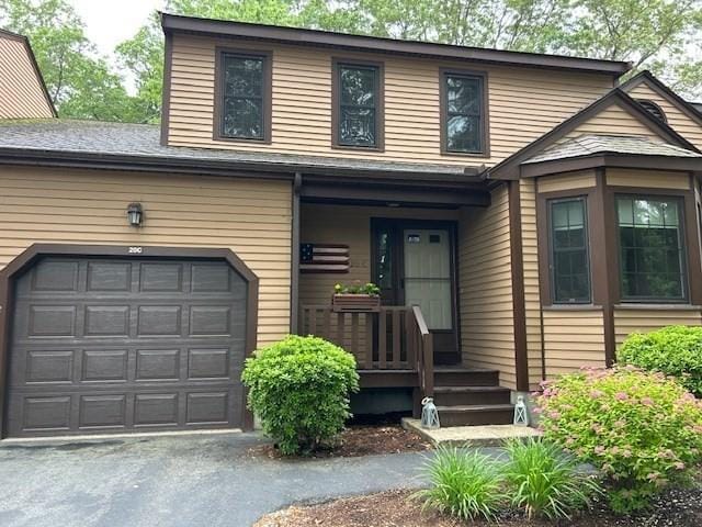 20 Hawthorne Vlg Unit C, Franklin, MA 02038 - view of front facade featuring driveway