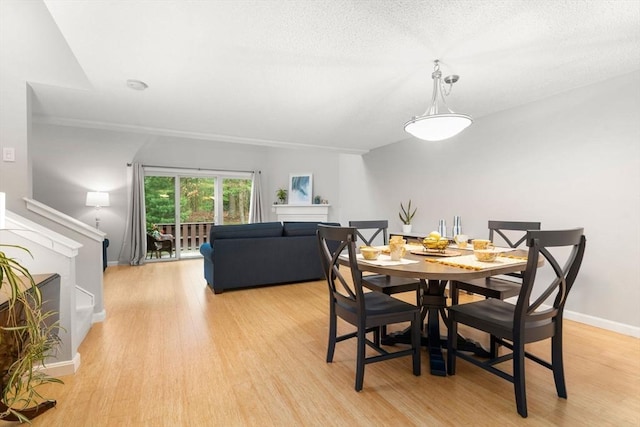 20 Hawthorne Vlg Unit C, Franklin, MA 02038 - dining area with light wood-style floors and stairway