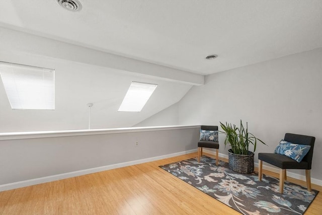 20 Hawthorne Vlg Unit C, Franklin, MA 02038 - sitting room with a skylight and wood finished floors