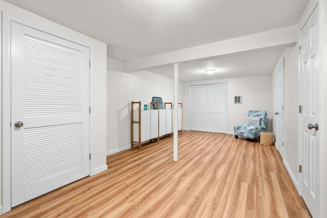 20 Hawthorne Vlg Unit C, Franklin, MA 02038 - basement featuring light wood-style flooring and baseboards