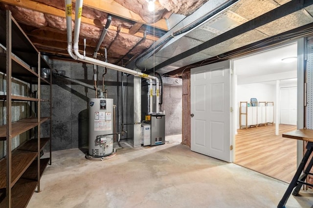 20 Hawthorne Vlg Unit C, Franklin, MA 02038 - unfinished below grade area featuring water heater and heating unit