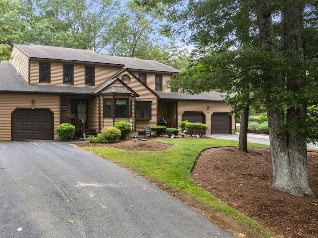 20 Hawthorne Vlg Unit C, Franklin, MA 02038 - view of front of property with an attached garage, driveway, and roof with shingles
