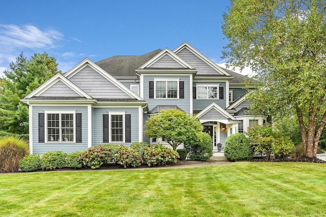 view of front of property with a front lawn