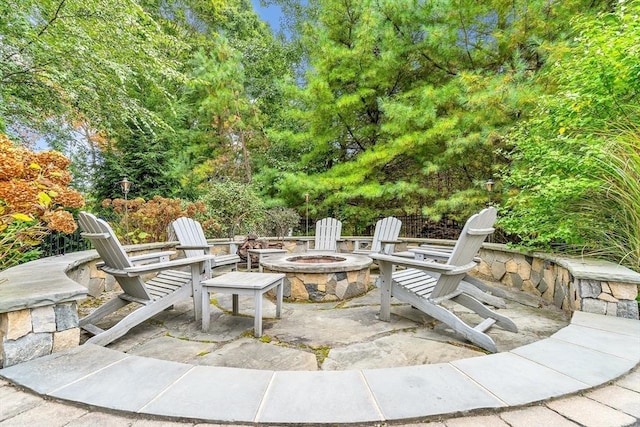 view of patio featuring a fire pit