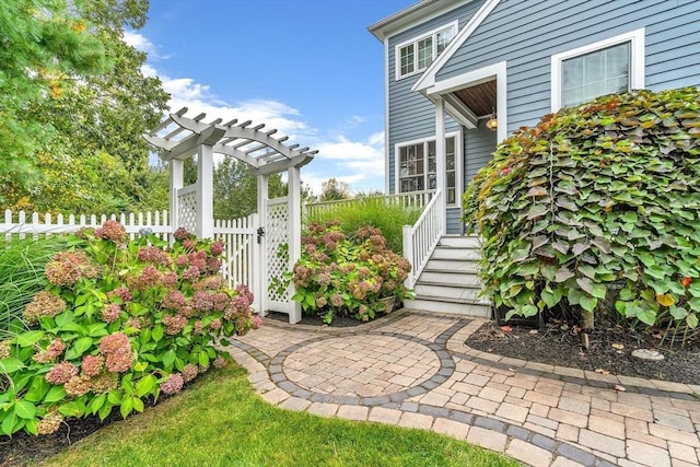 view of yard featuring a pergola and fence