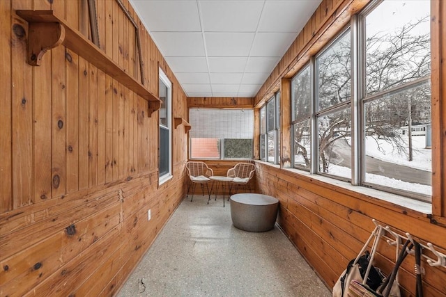 sunroom featuring a drop ceiling