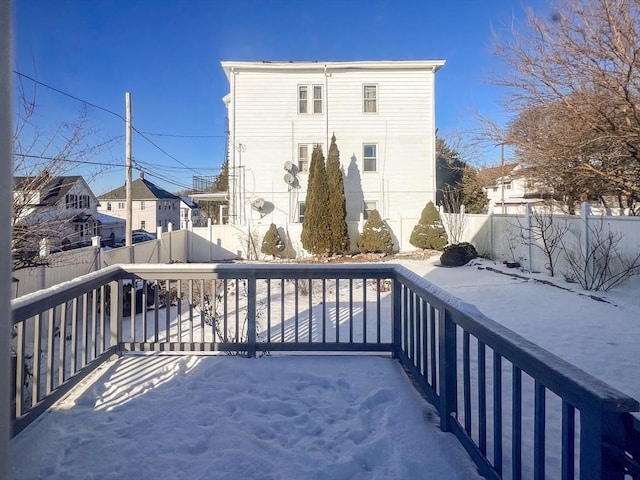 view of snow covered deck