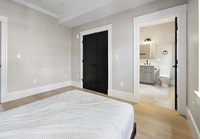40 Mount Vernon St Unit 2, Boston, MA 02129 - bedroom featuring light wood-style flooring, crown molding, and ensuite bath